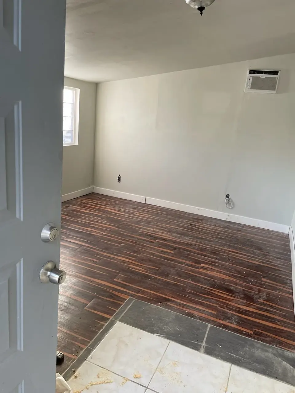 Interior room after refinish — walls, trim, and a cleaner closeout by Knight Group in Pinellas County