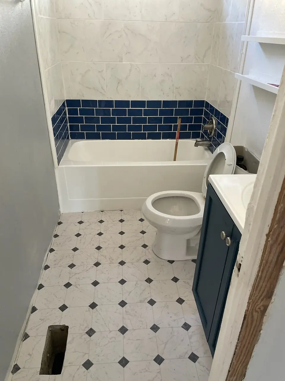 Bathroom remodel in process — tub tile, vanity, and floor work by Knight Group in Pinellas County
