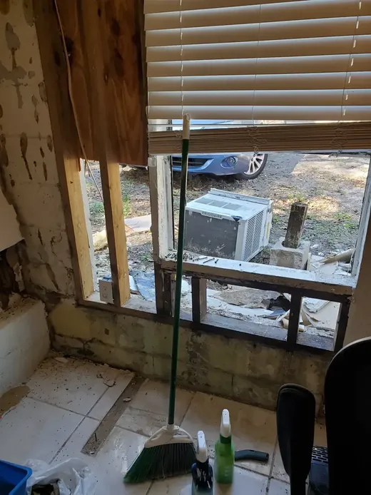 Window-wall damage opened so wet material could be removed — Knight Group job in Pinellas County